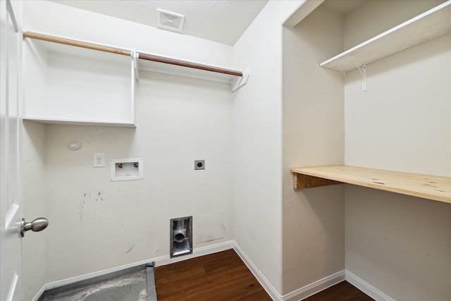 washroom featuring hookup for an electric dryer, hookup for a washing machine, dark hardwood / wood-style floors, and hookup for a gas dryer