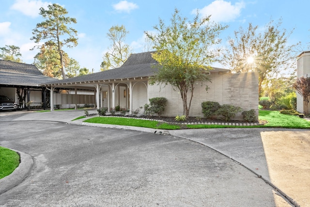 view of front of house with a carport