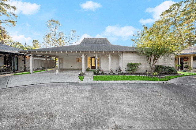 view of front of house with a carport