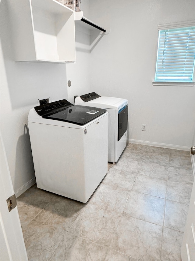 washroom with washer and clothes dryer