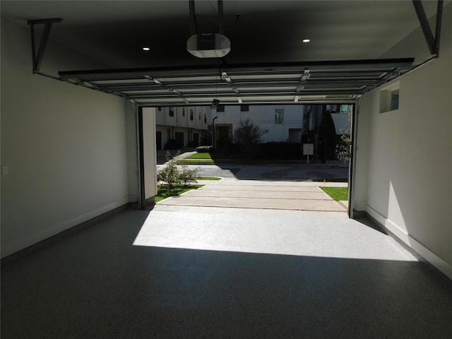 garage featuring a garage door opener