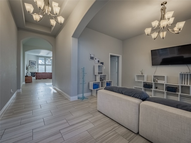 living room featuring an inviting chandelier