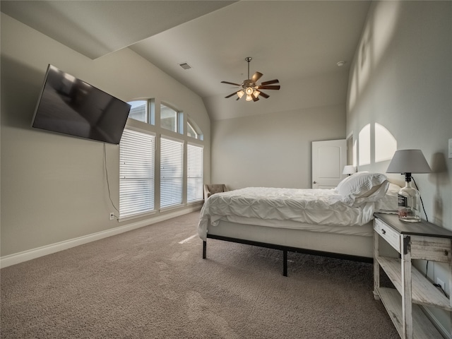 carpeted bedroom featuring ceiling fan and lofted ceiling