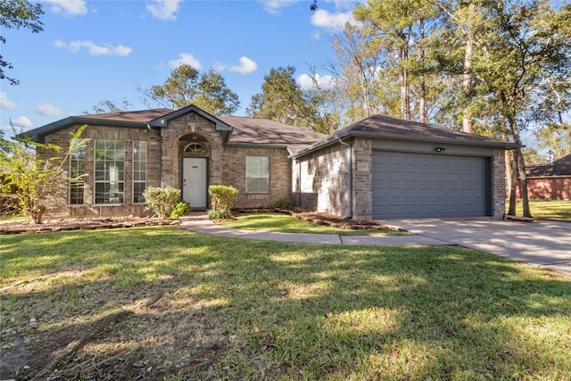 ranch-style home featuring a front yard and a garage