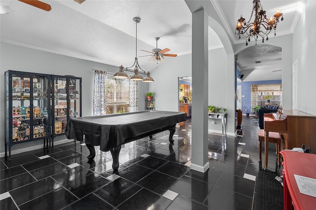 rec room with ceiling fan, billiards, a textured ceiling, lofted ceiling, and ornamental molding