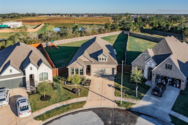 bird's eye view with a water view