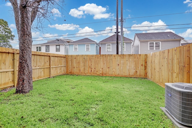 view of yard featuring central AC unit