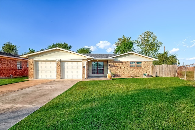 ranch-style home featuring a front lawn and a garage