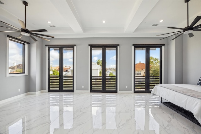 bedroom with french doors, access to outside, and multiple windows