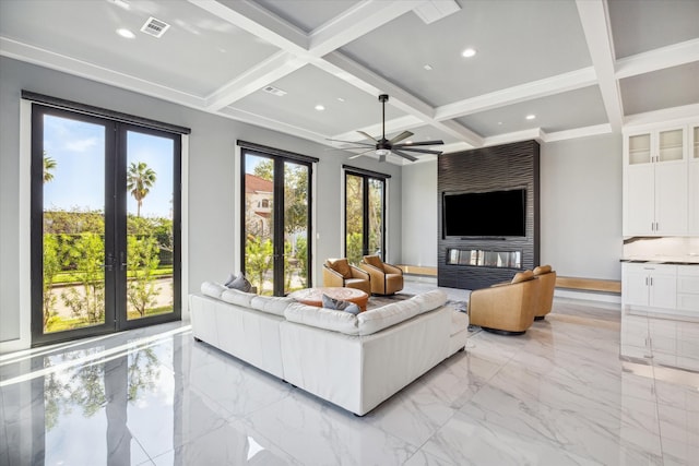 living room featuring ceiling fan, french doors, beamed ceiling, and coffered ceiling