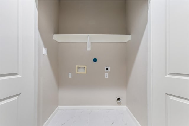 1321 E 35th St, Houston, TX 77022 - laundry area featuring hookup for an electric dryer, marble finish floors, washer hookup, gas dryer hookup, and baseboards