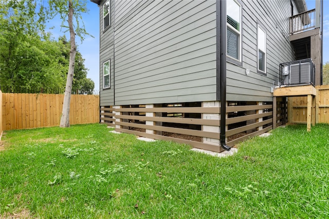 view of property exterior featuring a lawn