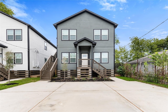 view of front of property with fence