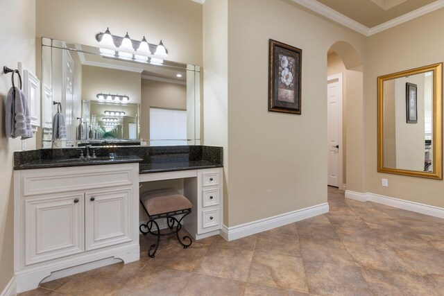 bathroom with vanity and ornamental molding