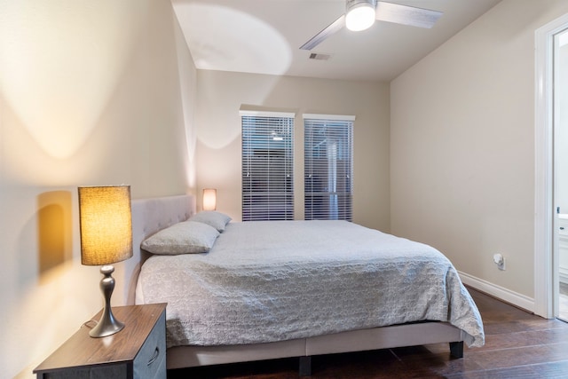 bedroom featuring dark hardwood / wood-style floors and ceiling fan