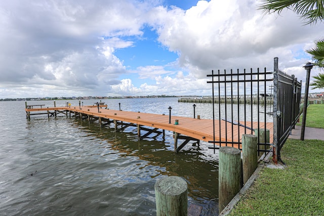 dock area featuring a water view