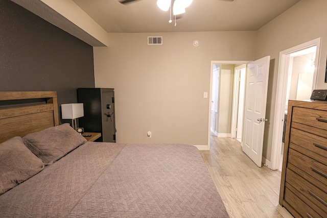 bedroom featuring ceiling fan and light hardwood / wood-style flooring