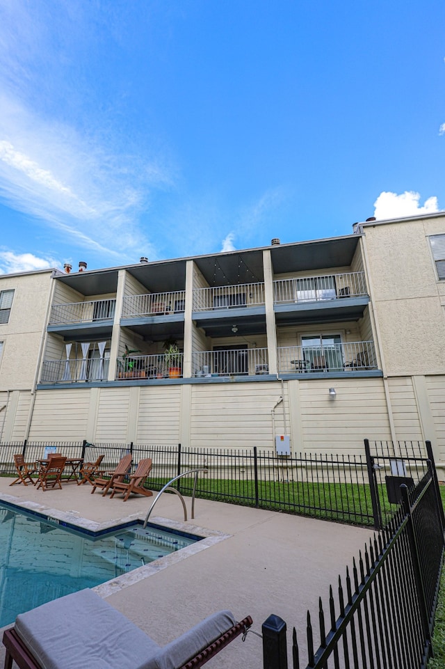 view of property with a community pool