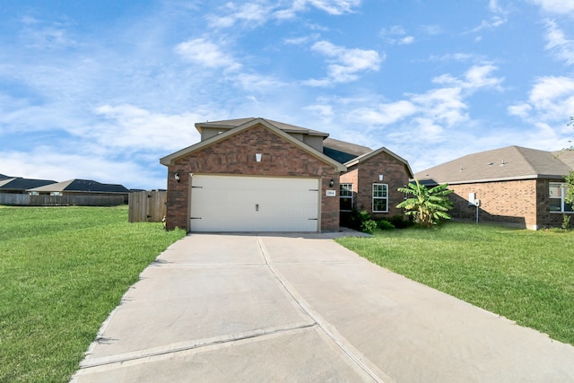 view of front facade featuring a garage and a front yard