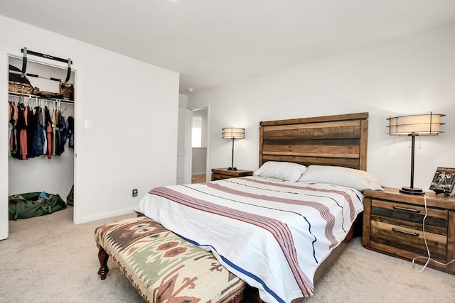 carpeted bedroom featuring a closet