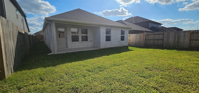 21258 Catalina Palm Dr, Cypress, TX 77433 - rear view of house with roof with shingles, a patio area, and brick siding