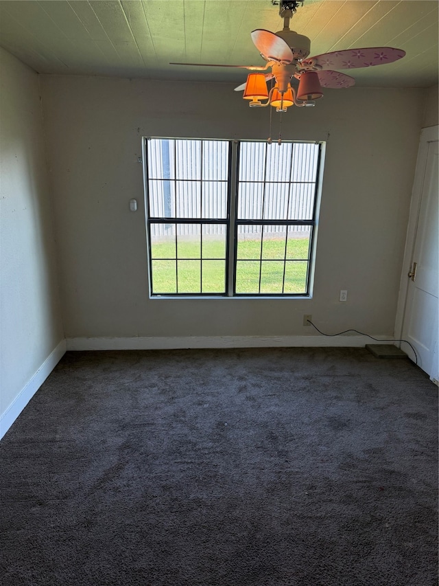 spare room with carpet and ceiling fan