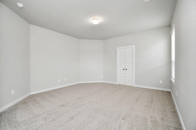 14906 Rural Ridge Rd, Cypress, TX 77429 - spare room featuring carpet floors, a smoke detector, and healthy amount of natural light
