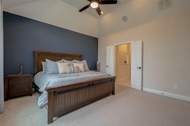 bedroom with light carpet, ceiling fan, and high vaulted ceiling