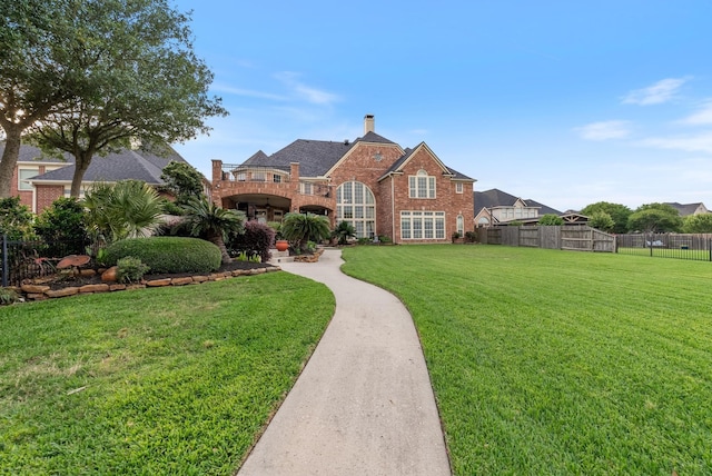 view of front of home with a front lawn