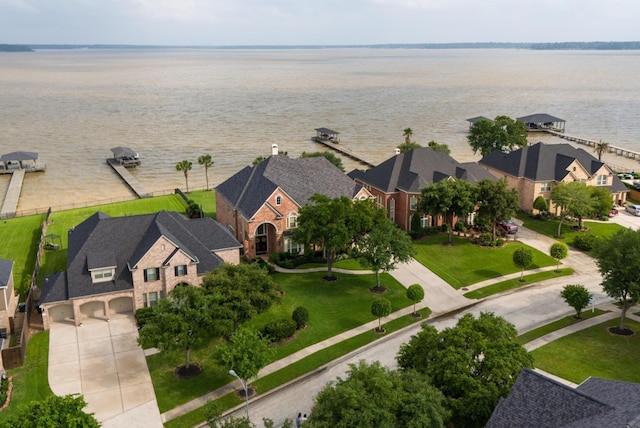 drone / aerial view with a water view