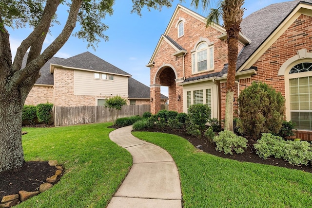 view of front of house with a front lawn