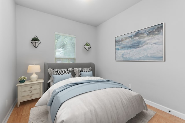 bedroom featuring light wood-type flooring