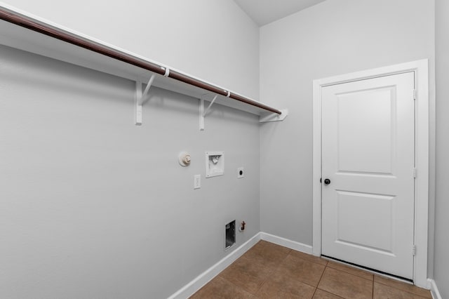 laundry area with electric dryer hookup, hookup for a washing machine, hookup for a gas dryer, and tile patterned flooring