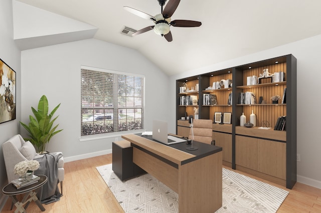 office with vaulted ceiling, light hardwood / wood-style flooring, and ceiling fan