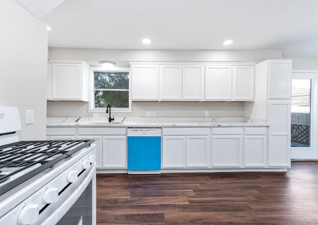 kitchen with white appliances, a wealth of natural light, dark wood-type flooring, and sink