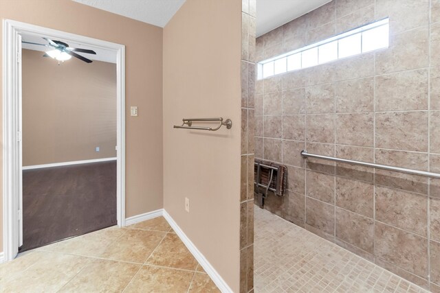 bathroom featuring tile patterned floors and ceiling fan