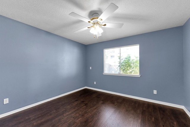 spare room featuring hardwood / wood-style floors, ceiling fan, and a textured ceiling