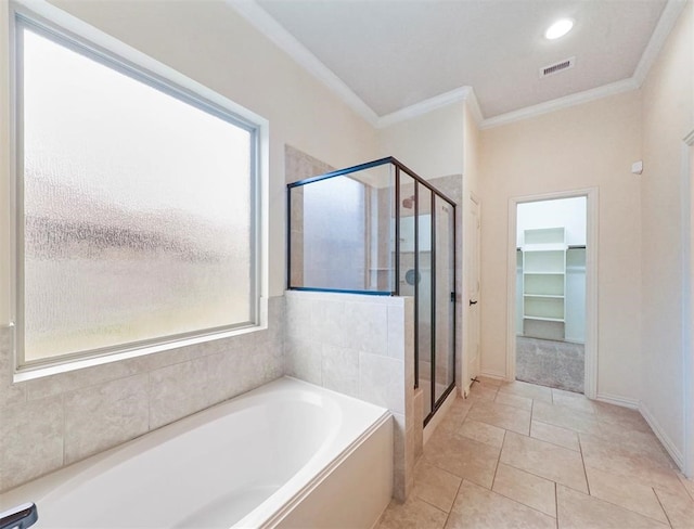 bathroom featuring independent shower and bath, a healthy amount of sunlight, and crown molding