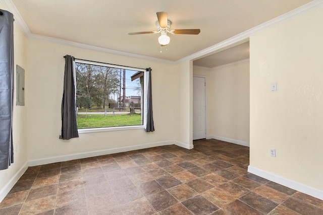 unfurnished room featuring ceiling fan and crown molding