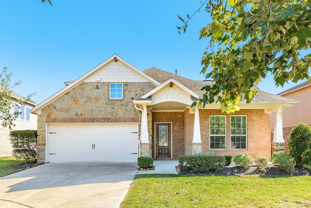 view of front facade featuring a front lawn and a garage