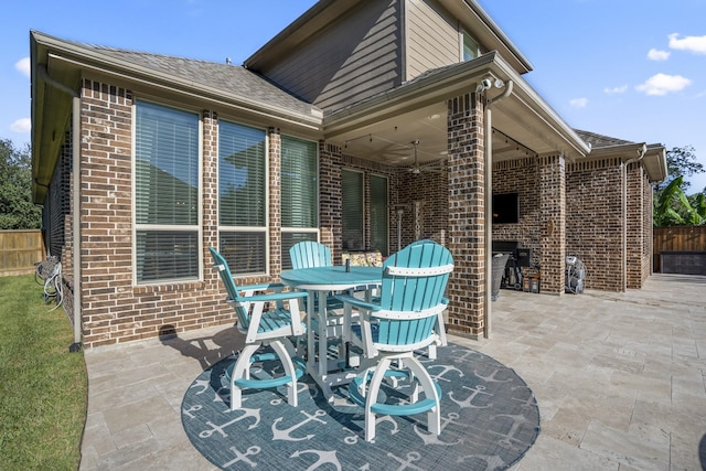 view of patio / terrace featuring ceiling fan