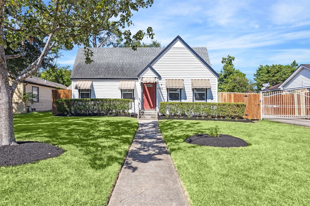 view of front of home with a front yard