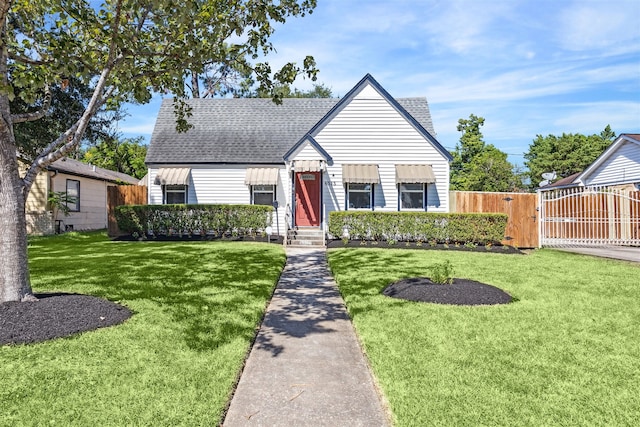 view of front of home with a front yard