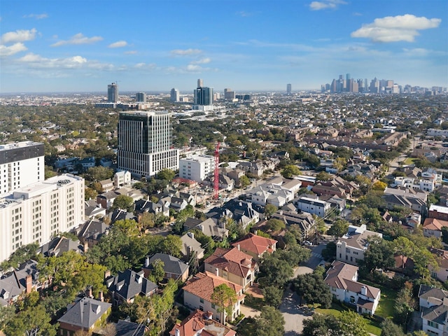 birds eye view of property featuring a city view