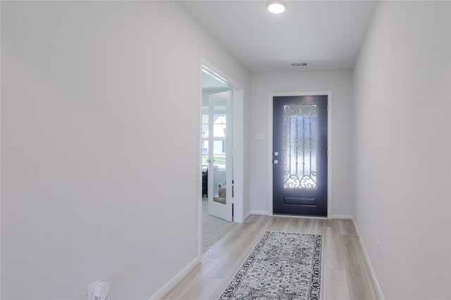 foyer entrance featuring light wood-type flooring