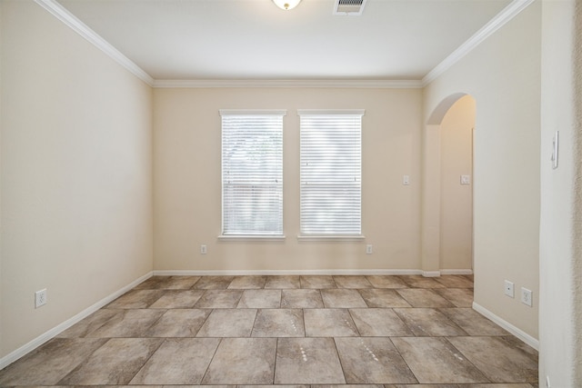 unfurnished room with ornamental molding