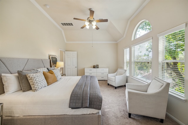 carpeted bedroom featuring multiple windows, ceiling fan, crown molding, and lofted ceiling