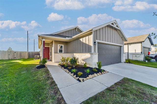 view of front of property with cooling unit and a front lawn