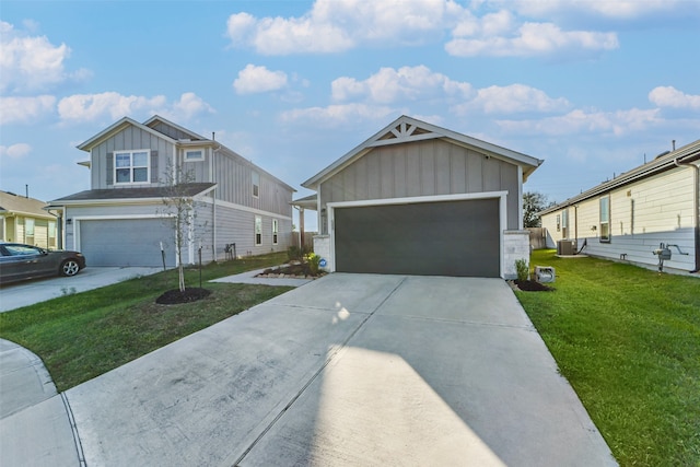 view of front of property featuring a garage and a front lawn