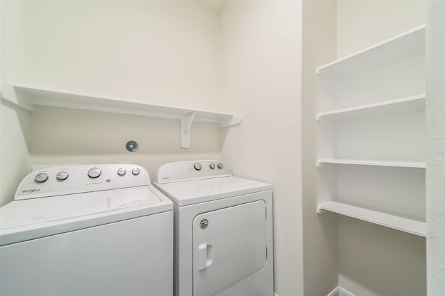 laundry room with washer and dryer